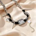 Detailed view of vintage punk Y2K silver choker featuring a watch pendant and heart charms - Black Braided Rope