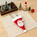 Santa Claus hat cutlery holder for Christmas table decoration and party setting - Santa Claus