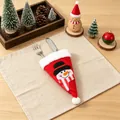 Christmas cutlery holder with snowman design showing fork and knife placement - Snowman