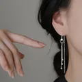 Eleganti orecchini a catenella con stella in argento e nappine con perline per donna - Orecchini a filo con stella e nappa