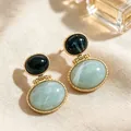 Elegant vintage style contrasting green and black oval stone drop earrings in gold finish - 2607096 Green Oval Earrings