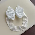 Elegant white lace baby headband featuring a large delicate bow for newborn girls. - White Lace Headband