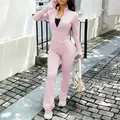 Pink Y2K yoga set including long-sleeve zip jacket and flare pants for women - Pink / XS