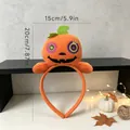 Halloween plush pumpkin headband party accessory shown with dimension markings - Pumpkin