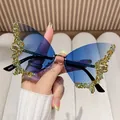 Stylish butterfly shaped rimless sunglasses with blue gradient lenses and rhinestones - Gold Frame/Sky Blue/Gold Base Blue Rhinestone
