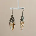 Detailed close-up of retro rhombus openwork earrings with elegant beaded tassels on a stand - Streaming Flower Tassel (63# Earring Hook-Gold) / Brown
