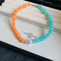 Dopamine style acrylic necklace featuring vibrant orange and blue beads with a pearl center - Light Orange-Light Blue