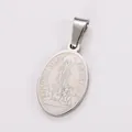 Detailed macro view of an oval stainless steel pendant featuring a religious relief carving - Large Size (AML035151) / Steel
