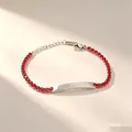 Detail view of a stainless steel bracelet with red zircons and an engravable bar. - Round Red Rhinestone Style (A635-爪锆-手链) / Silver