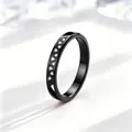 Close-up of a black stainless steel ring with CNC engraved triangle pattern and crystals - Size 5 / Black