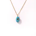 Vintage gold-plated stainless steel necklace with blue resin pendant and red drop stone - Lake Blue Oval Inlaid Pendant (Style 17)