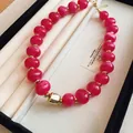 Macro view of vibrant magenta beaded necklace with gold accents in a jewelry box - Gold-Rose Red (77#)
