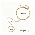 Elegant gold-plated stainless steel double-layer hand harness chain with ring detail - Curb Chain Style (E2519) / Gold