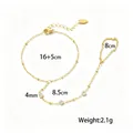 Catena per il dorso della mano in acciaio inossidabile placcato oro con misure precise - Stile Strass Bianco Perlina Dorata (E2515)