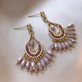 Close-up of vintage gold-toned tassel earrings with mauve teardrop beads - Streaming Flower Tassel (64# 925 Sterling Silver Earring Post-Silver) / Purple
