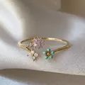 Anello regolabile placcato oro 18K con fiori in zircone viola e bianco - Aperto Regolabile / Viola Bianco Piccoli Fiori (JZ002)