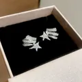 Sparkling cubic zirconia star ear clips in an elegant gift box for non-pierced ears - Star Style / One Pair / Silver