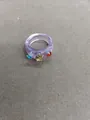 Elegant purple resin ring featuring colorful rhinestones in a minimalist aesthetic design - Purple-Brown