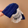Detailed view of a vintage blue fabric hair claw clip with silver tassel fringe - Tassel Printed Hair Claw / Silver Blue