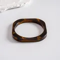 Detailed view of vintage square resin bangle with brown tortoiseshell marbled texture - Style 1 (Square Coffee)