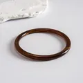 Detailed view of vintage brown marbled resin bangle bracelet with smooth glossy finish - Style 4 (Thin Circle Coffee)