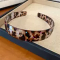 Detail of a chic French retro leopard print acrylic headband inlaid with tiny rhinestones - White Leopard - Multicolor Rhinestone