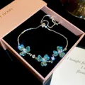 Close-up of elegant 18k gold plated bracelet with blue butterfly crystals and pearls - 5# Bracelet