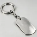 Macro view of a blank stainless steel dog tag keychain with a mirror polished finish - Steel