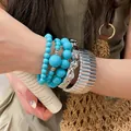 Set di bracciali con perline acriliche turchesi e rigidi in metallo argento - Stile 44 / Set da 5 Pezzi / Argento, Blu