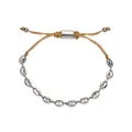 Detailed macro view of a stainless steel coffee bean link bracelet with tan cord. - Woven Cord Adjustable Bracelet / Steel