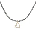 Detailed view of a heart pendant necklace featuring gray metallic beads and gold finish. - Heart Style