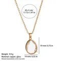 Elegante collana medaglione a goccia dorata con ciondolo in vetro e misure indicate - Collana medaglione trasparente a goccia