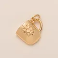 Detailed close-up of gold mug pendant with engraved snowflake motif charm - Water Cup Pendant