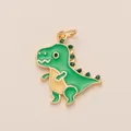 Detailed macro shot of a green enamel dinosaur charm with sparkling green rhinestones - Dinosaur Pendant