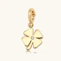 Elegante colgante para zapatos de trébol dorado con un cristal brillante central. - Trébol de cuatro hojas