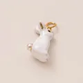 Detail of white enamel rabbit charm with pearl tail and gold-tone loop - Bunny Pendant