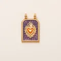 Detailed view of a vintage sacred heart pendant with purple enamel and gold finish - Purple Sacred Heart