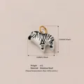 Detailed view of stainless steel zebra charm pendant with dimensions 19x15mm and 6g weight - Zebra Pendant
