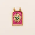 Detailed view of a Sacred Heart copper pendant with pink and green enamel inlay work - Pink Sacred Heart