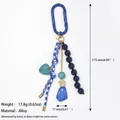Vintage blue beaded heart bag charm with alloy accents and measurement details. - Blue Bead Sea Shell Charm / Blue