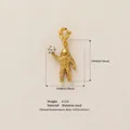 Detailed golden stainless steel astronaut pendant holding a star charm for DIY jewelry - Astronaut Pendant