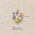 Detailed close-up of a cartoon rabbit shield pendant in stainless steel with specs - Spotted Rabbit Shield Pendant / Pendant Only (No Chain)