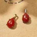Teardrop shaped red gemstone pendants in gold and silver tone for DIY jewelry making. - Red Teardrop Pendant / Gold
