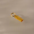Elegant gold-toned titanium steel pendant featuring a rectangular faceted yellow zircon stone - November Pendant (Topaz Color)