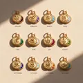 Detailed display of 12 vintage gold-plated birthstone flower relief coin pendants - January Birthstone Pendant