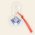 Detail view of summer ocean style keychain with hand-painted crab pattern and red cord - Crab