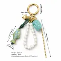 Elegant koi fish pearl bag charm with gold alloy ring for luxury handbag accessories - Turquoise Fish Bead Charm