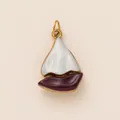 Detail view of a vintage enamel sailboat charm for DIY bag accessories and jewelry - Sailing Boat Pendant