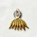 Detailed view of a gold-plated stainless steel and ceramic artistic pendant with intricate patterns - Fan-shaped Portrait Pendant