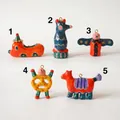 Artistic handcrafted colorful abstract ceramic charms in unique car, horse, and pretzel shapes - Scooter Pendant